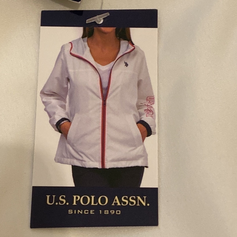 U.S. POLO ASSN. light white jacket . Perfect everyday / rain orSize L . New.